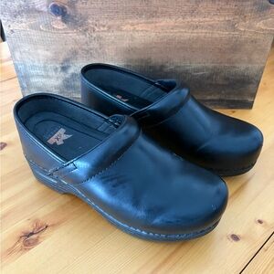 Dansko Black Leather Slip-On Clogs